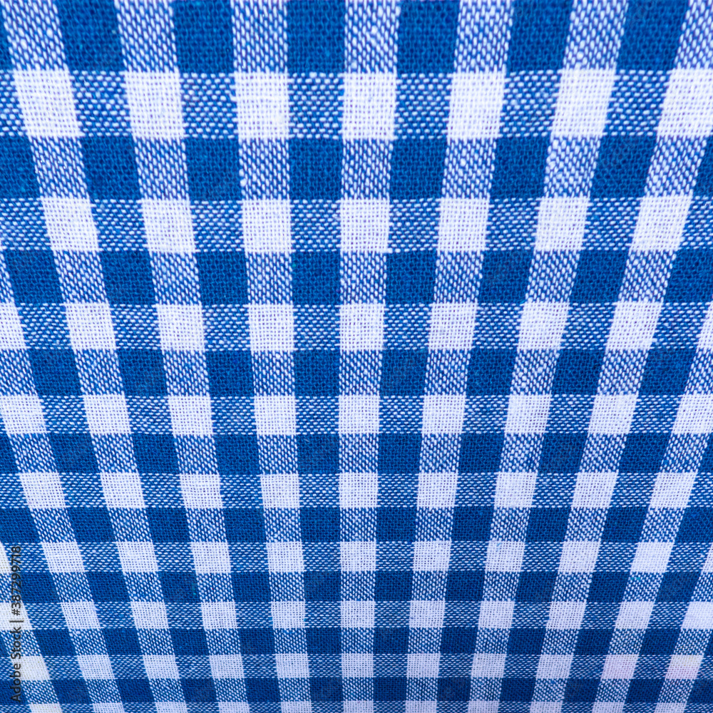 Close up of blue and white cross pattern and texture, as distorted chess table. blue and white chess table. Close up of blue and white cross pattern and texture, as distorted chess table. blue and white chess table.