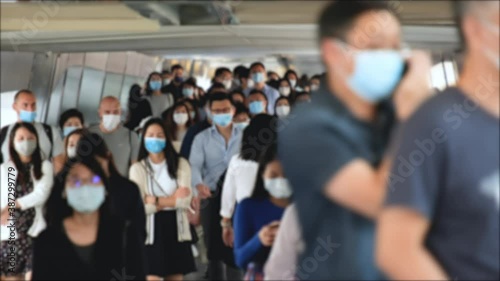 Timelapse of unrecognized people wearing medical face masks in Hong Kong. Coronavirus concept