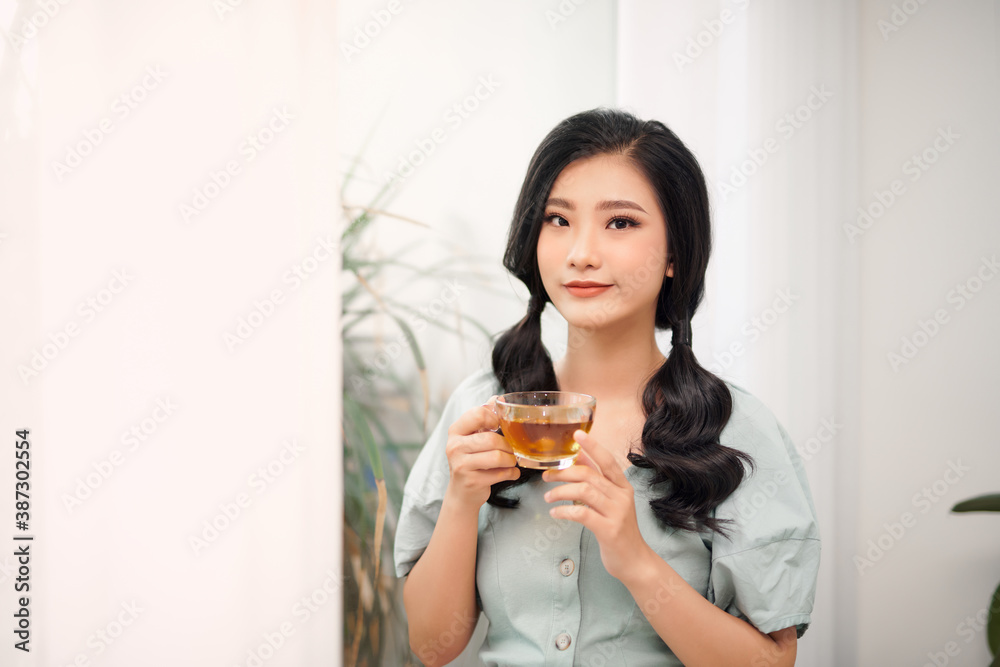 young attractive asian woman who drink tea young attractive asian woman who drink tea