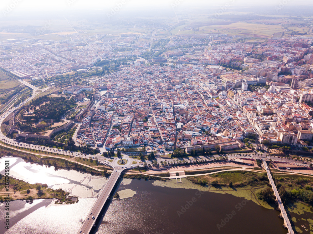 Aerial panoramic view of modern cityscape of Badajoz with Guadiana river, Spain