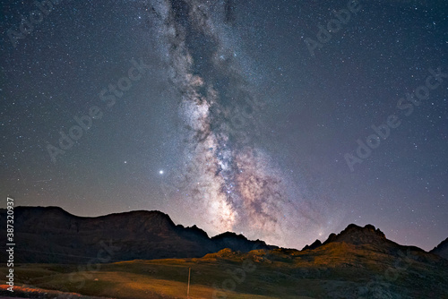 milkyway over the mountains and cloud photo