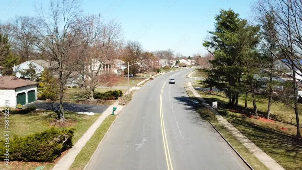 Aerial Street View Shot of a Suburban Neighborhood Aerial Street View Shot of a Suburban Neighborhood