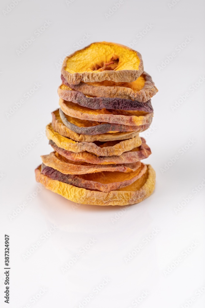 slices of dried peach on a white background. dried fruits. eco. macro. slices of dried peach on a white background. dried fruits. eco. macro.