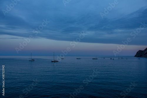 View of Boats at Sea at Sunset, Monterosso al Mare, Italy