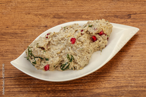 Vagan dietary cusine - mutabal with granet seeds