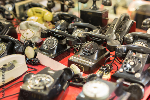 Set of Antique Telephones on a Table: Vintage Objects