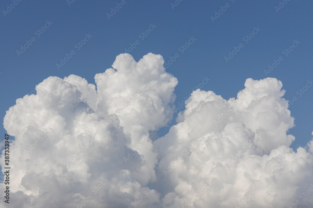 fluffy clouds and blue sky background fluffy clouds and blue sky background