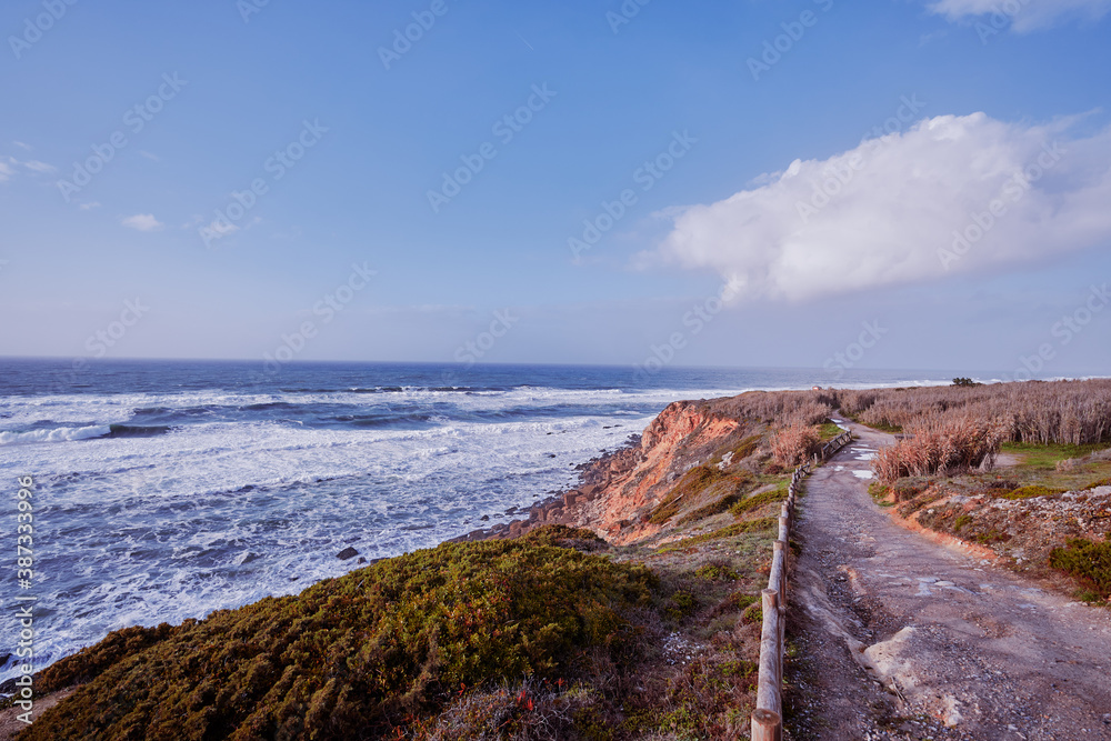 Picturesque pathway on rock ocean shore, Portugal. Picturesque pathway on rock ocean shore, Portugal.
