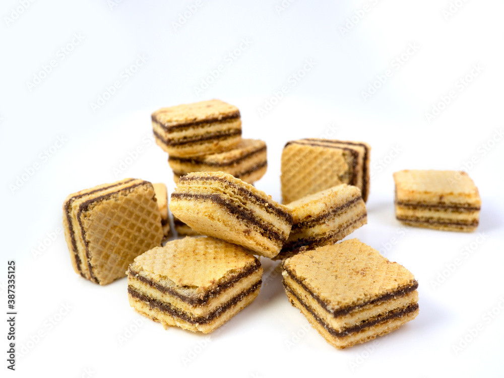 Crispy chocolate wafer flavor, square wafer biscuits on white Crispy chocolate wafer flavor, square wafer biscuits on white