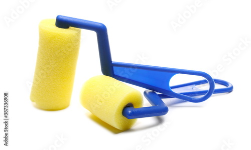 New clean sponge rollers for home renovation isolated on white background