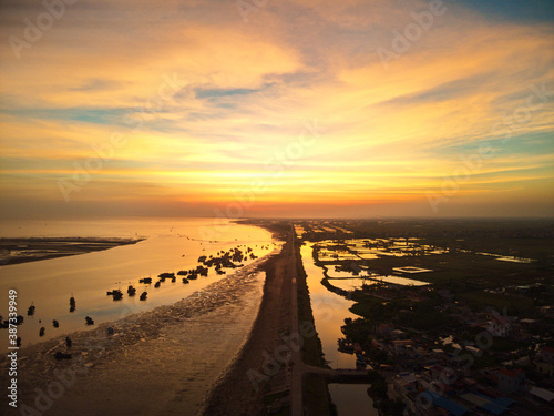 Sunset over a sea mouth in Northern Vietnam