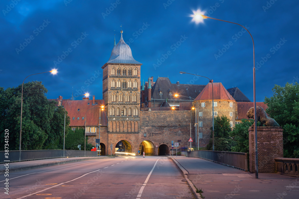 Lubeck, Germany. Burgtor - northern gate of the old town (HDR image at dusk)