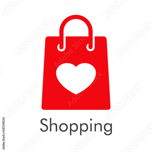 Símbolo de tienda en línea. Logotipo con texto Shopping con bolsa de la compra con corazón en color rojo
