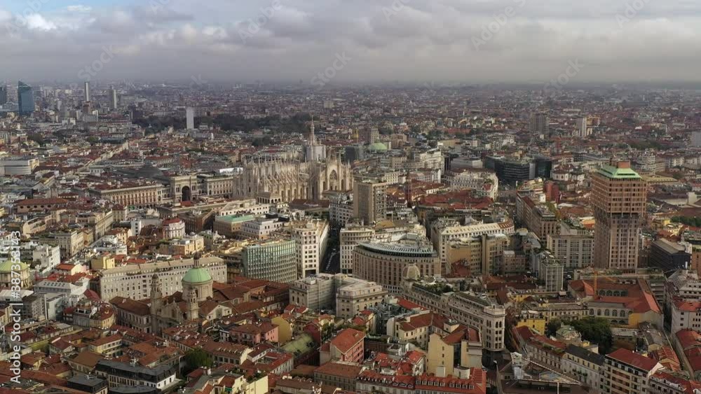 Milan, Italy: Aerial view of historic part of city with gothic Milan Cathedral - landscape panorama of Europe from above Milan, Italy: Aerial view of historic part of city with gothic Milan Cathedral - landscape panorama of Europe from above