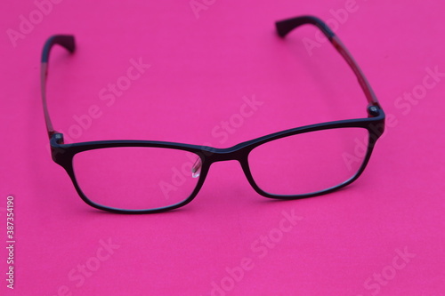 glasses on the pink scene.