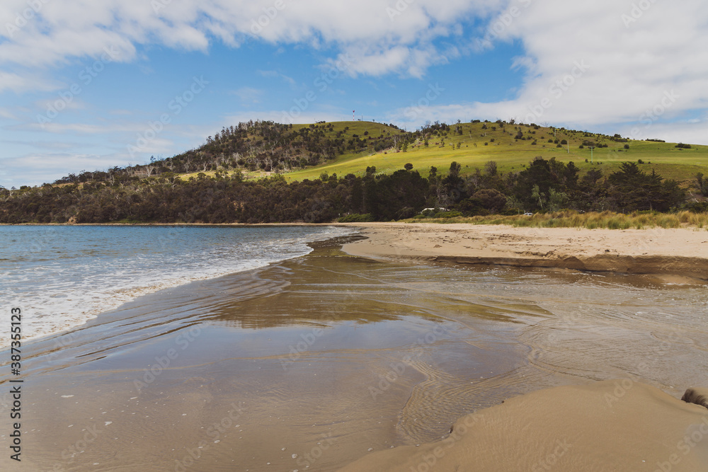 Seven Mile beach a pristine golden sand beach just outside of the city of Hobart in Tasmania, Australia Seven Mile beach a pristine golden sand beach just outside of the city of Hobart in Tasmania, Australia