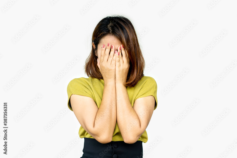 depressed Asian woman hand covering her face in deep many thoughts depressed Asian woman hand covering her face in deep many thoughts