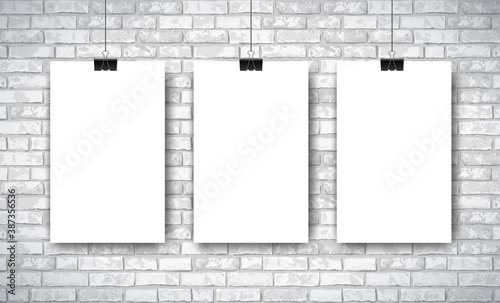 Mockup with three empty white posters on white brick wall background. Trendy portfolio blanc space frame background. Vector Illustration for web portfolio, poster mock up, advertising