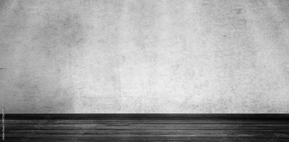 empty room with concrete wall and wooden floor empty room with concrete wall and wooden floor