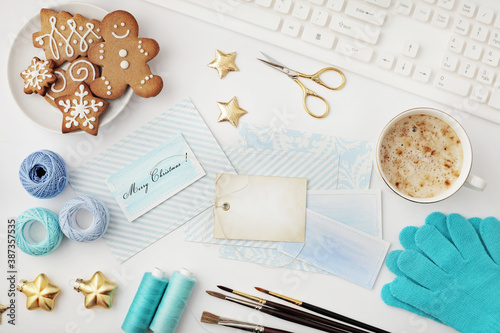 christmas workspace flat lay, gift wrapping, gingerbread cookies