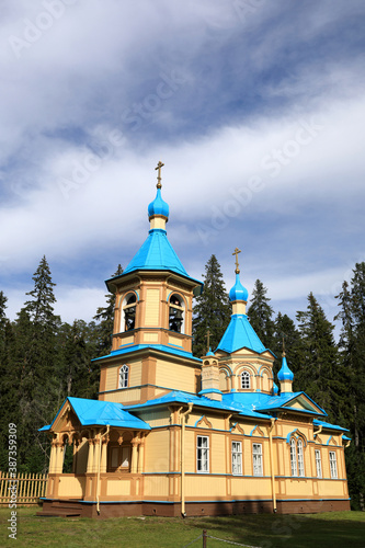 View of wooden orthodox church in forest