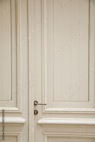 White wooden doors background.