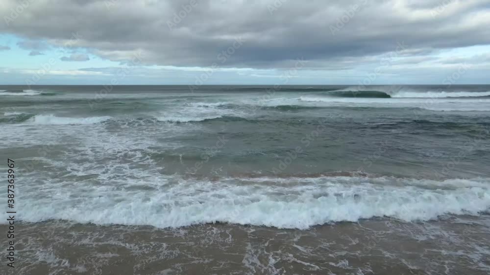 Ocean waves breaking underneath the camera Ocean waves breaking underneath the camera