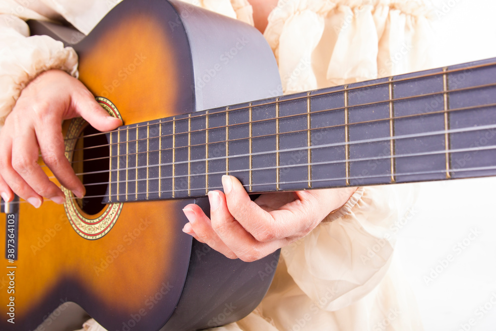 Obraz premium classical guitar detail with shallow depth of field