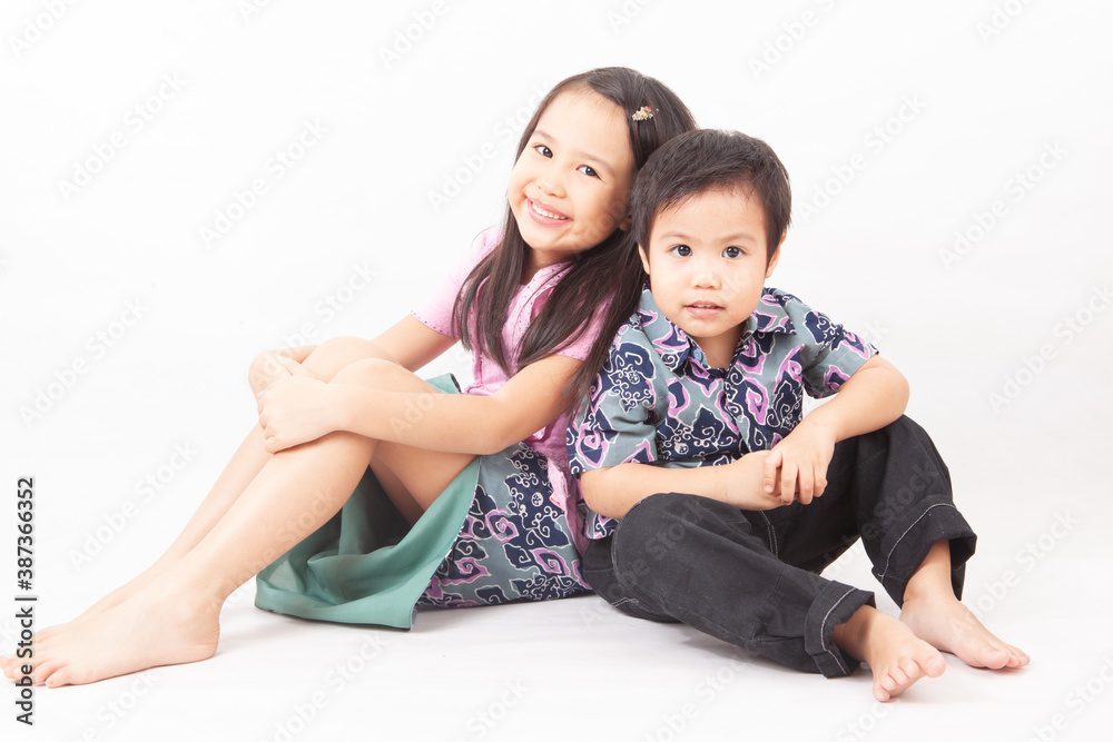 Togetherness of Sibling wearing batik Togetherness of Sibling wearing batik
