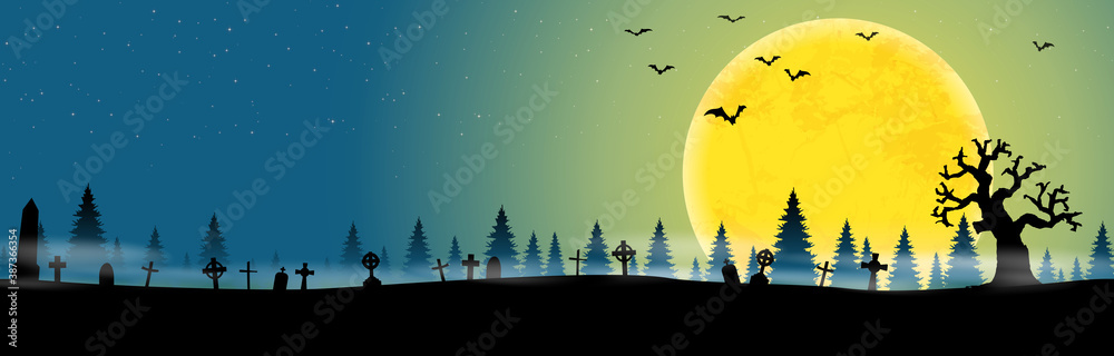 halloween cemetery in front of woodlands with full moon