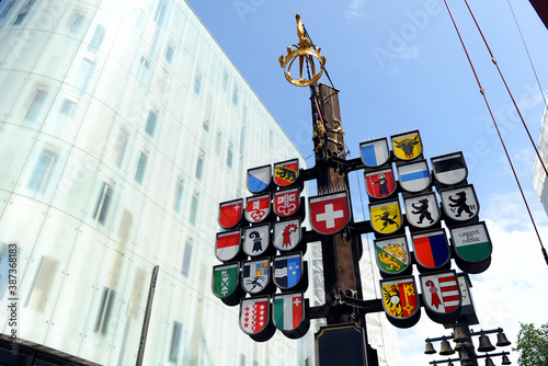 Swiss Cantonal Tree on Leicester Square. The tree displays 26 Coats of Arms of Switzerland in London, United Kingdom photo