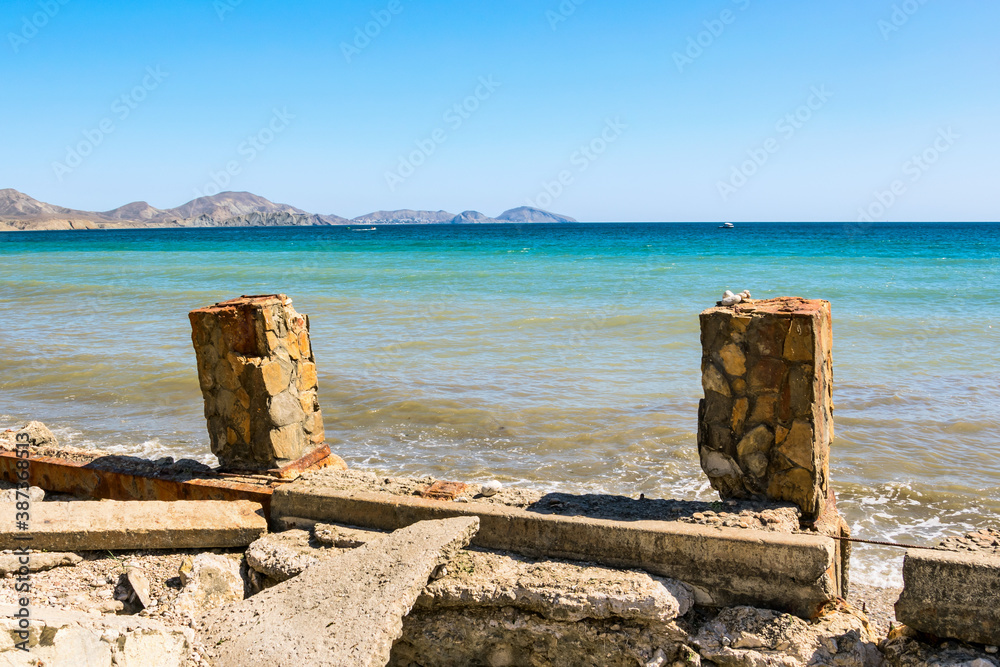 Unclear objects on the shores of a troubled muddy sea Unclear objects on the shores of a troubled muddy sea