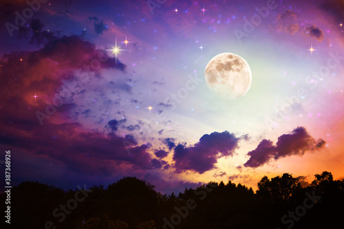 Blue abstract sky background with stars and full moon.