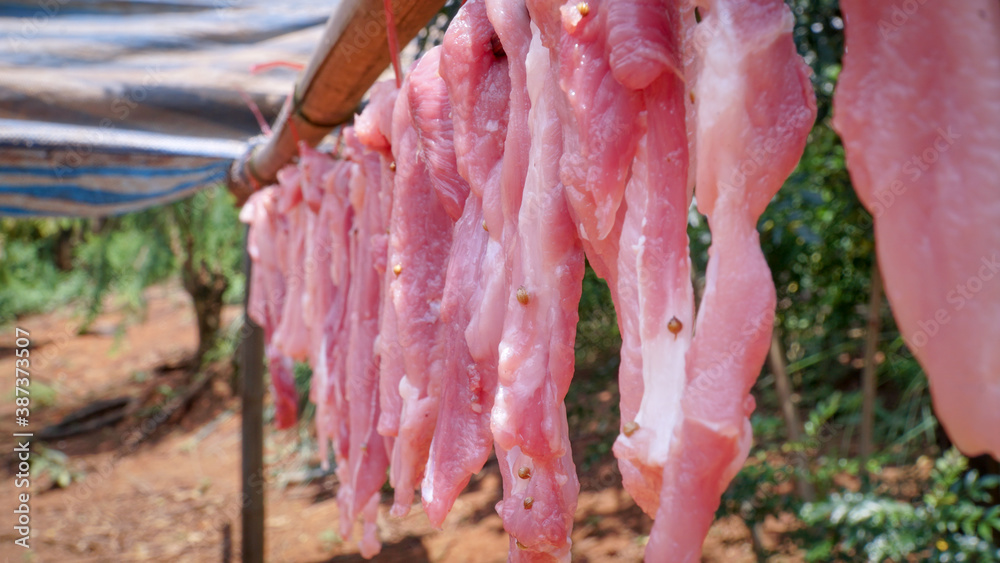 Sun Dried Asain Pork Marinated Handing at Local Fresh Farmer's Market