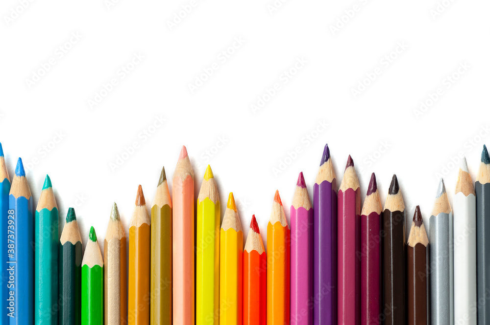 multicolored pencils lie on a white background multicolored pencils lie on a white background