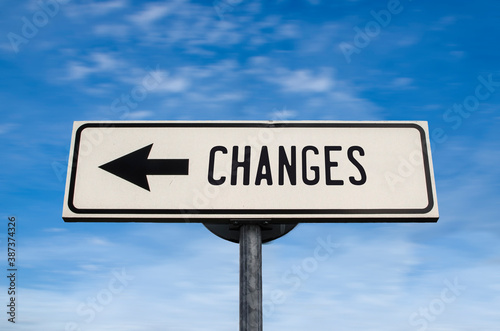 Changes road sign, arrow on blue sky background. One way blank road sign with copy space. Arrow on a pole pointing in one direction. Search for changes.