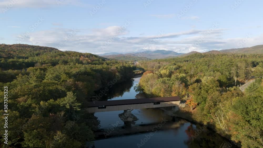 Amazing View of Bridge over River with Scenic New England Nature Backdrop. Aerial Establishing Drone View Amazing View of Bridge over River with Scenic New England Nature Backdrop. Aerial Establishing Drone View