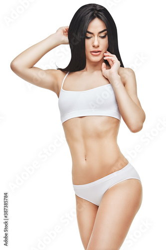 Fitness young woman with a beautiful body