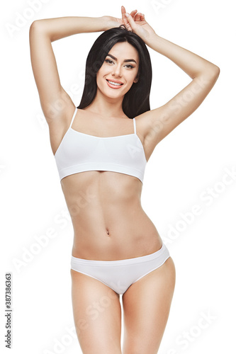 Fitness young woman with a beautiful body