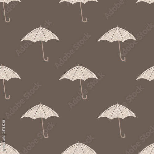Autumn seamless patern with light umbrella silhouettes. Beige background. Minimalistic style.