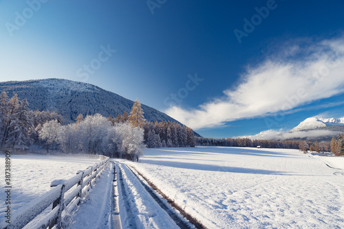 Wallpaper Mural Austria snow christmas trail landscape with mountains and blue and cloudy sky Torontodigital.ca
