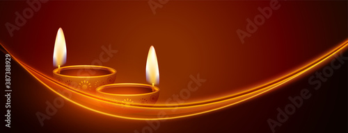 happy diwali banner with glowing light streak design