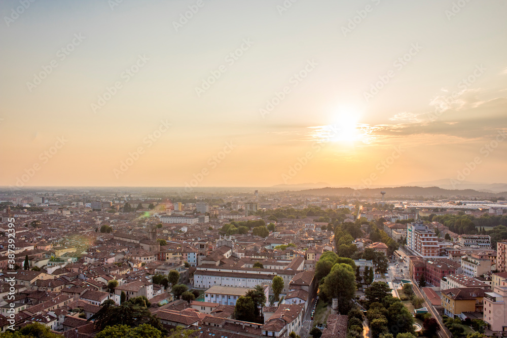 Skyline of Brescia from the Castle at the sunset. Roman ancient castle. Lombardy region of Italy.