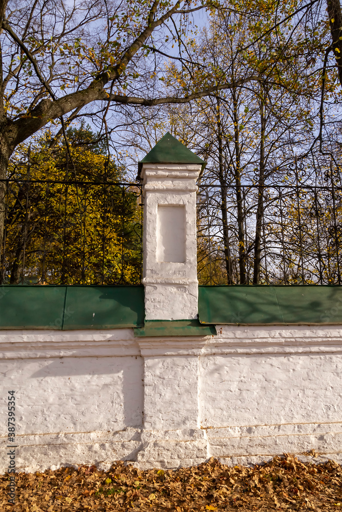 Fototapeta premium brick fence with bars