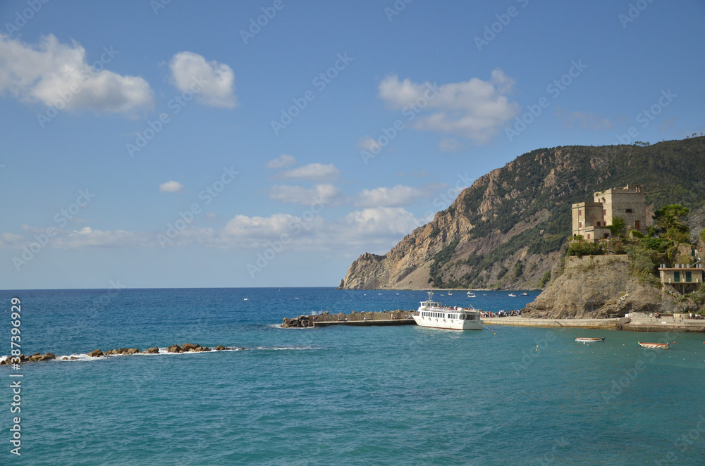 Beautiful beach at Monterosso, Cinque Terre, Italy. People enjoying their holiday here.