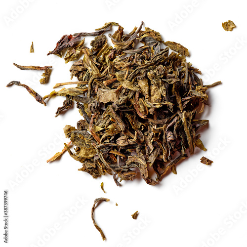 Heap of Ginseng green tea isolated on white; from above