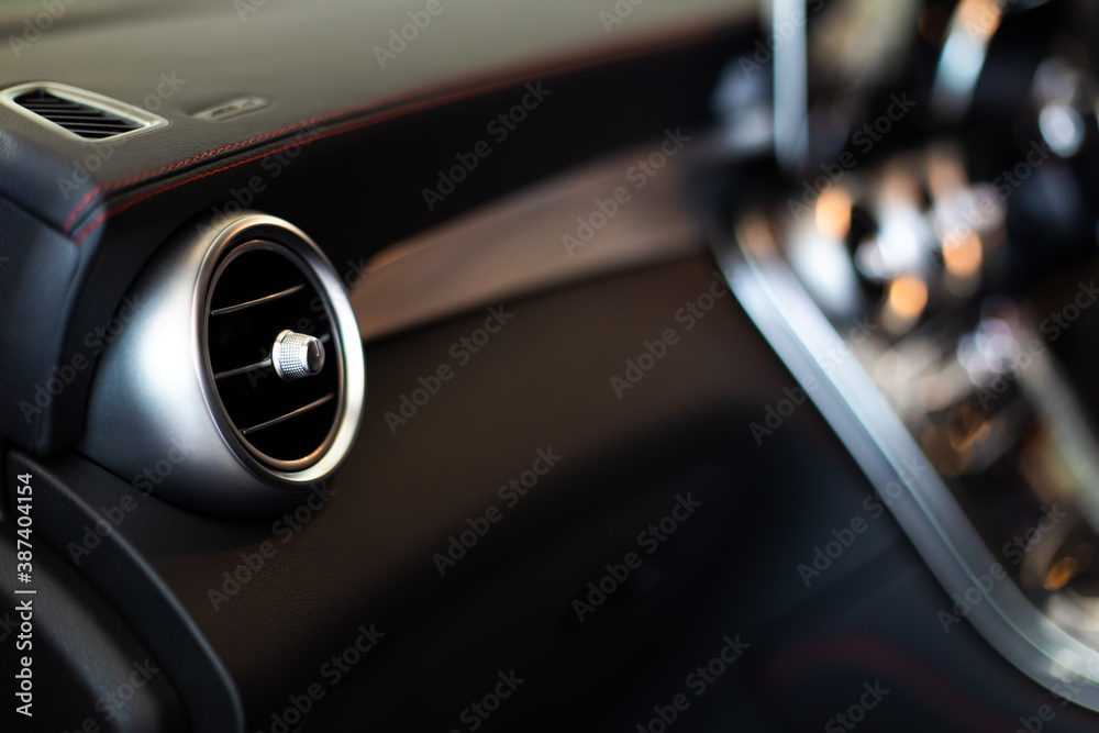 Air conditioning system and dashboard. Close up and interior details of modern luxury sport cars.