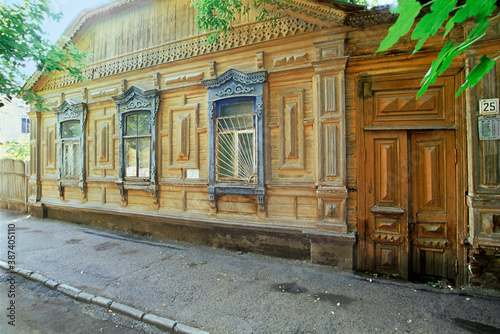 An old Russian wooden house from the times of the Russian Empire with elements of carved decorations. Astrakhan, Russia.