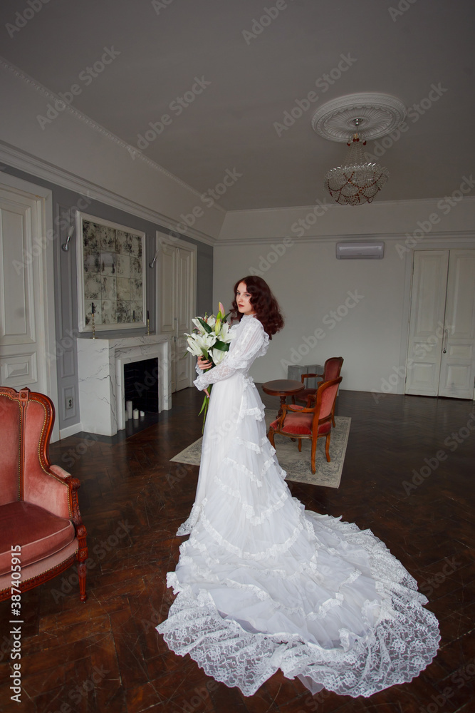 beautiful girl with a bouquet of lilies