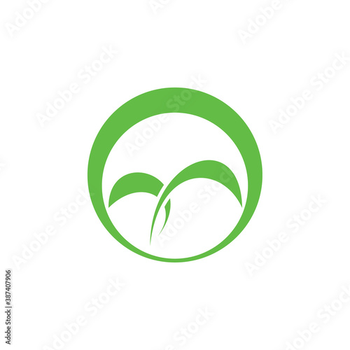 Circle with leaf, M letter, mountain silhouette logo design vector